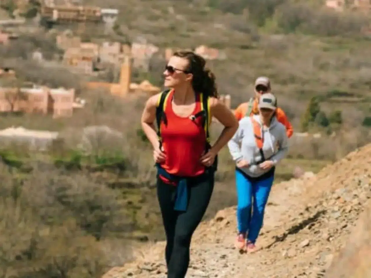 Family hiking together through scenic trails during a 5-day trek, surrounded by nature and stunning landscapes.